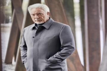 Tom Jones reacts to becoming oldest singer to top UK charts.