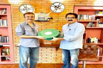 MUMBAI. July 6: Veteran filmmaker Rajkumar Hirani today handed over the original camera celluloid negative of his 2014 blockbuster film, "PK" to Prakash Magdum, Director, NFAI, in Mumbai.