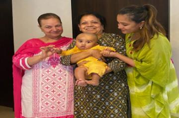 Anita Hassanandani shares photos of son Aaravvs mundan ceremony.