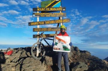 Cyclist reaches top of Kilimanjaro, unveils Sonu Sood poster