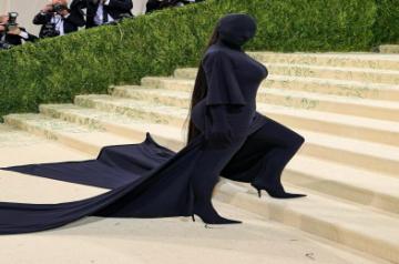 Met Gala 202:: Kim Kardashian's black faceless full-body suit has a Kanye West connect.