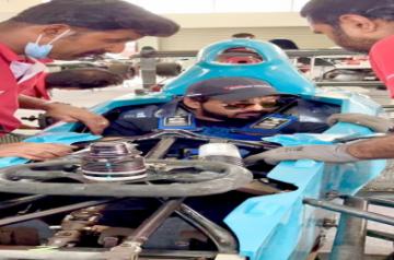 Actor Jai in his race car