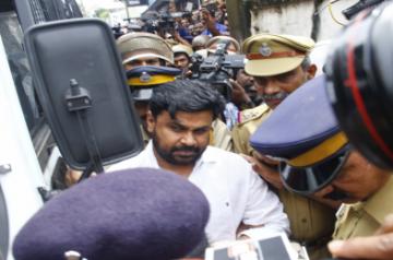 Kochi: Actor Dileep being taken to be produced before Judicial First Class Magistrate Court Angamaly in connection with the abduction and molestation of a popular actress in Kochi on July 14, 2017. (Photo: IANS)
