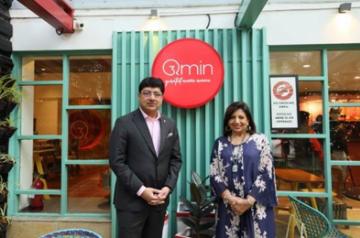 Mr. Puneet Chhatwal, Managing Director and CEO, IHCL and Ms. Kiran Mazumdar Shaw, Executive Chairperson & Founder Biocon Biologics raising a toast at Qmin outlet in the garden city