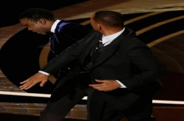 Academy says it 'doesn't condone violence'after Will Smith slaps Chris Rock.