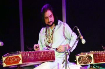 Santoor player Bhajan Sopori performs during the Rashtriya Sanskriti Mahotsava in Varanasi. (Photo: IANS)