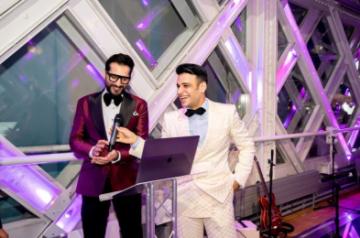 Comedian Nitinn R Miranni  leads to the group to sing the National Anthem on the eve of celebrations