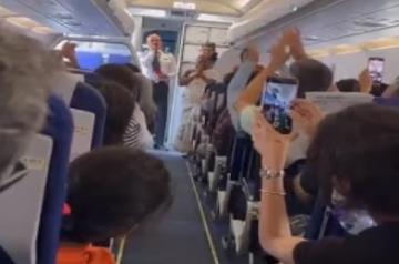 Bomman, Bellie of 'The Elephant Whisperers' cheered as they board flight (grab)