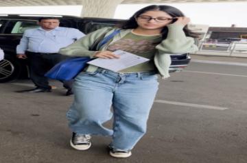 Navya Naveli sports nerdy look as she walks to board flight at Mumbai airport